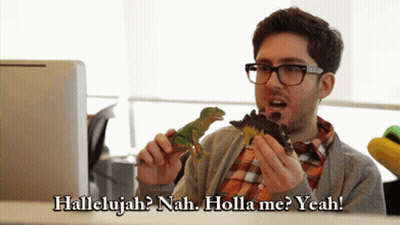 A Man Holding A Toy Dinosaur With The Words Hallelujah Nah Holla Me Yeah GIF