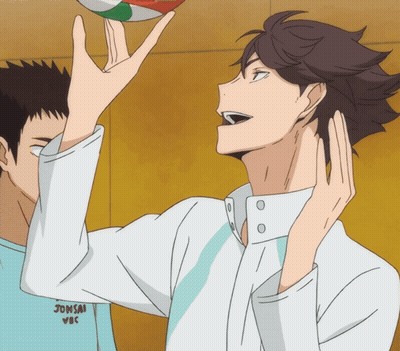 A Man Holding A Volleyball With A Shirt That Says Jonsai Vbc On It GIF