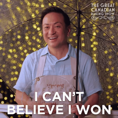 A Man Holding An Umbrella With The Words " I Can 'T Believe I Won " Above Him GIF