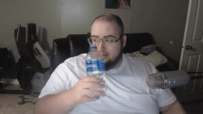 A Man Holds A Bottle Of Aquafina Water GIF