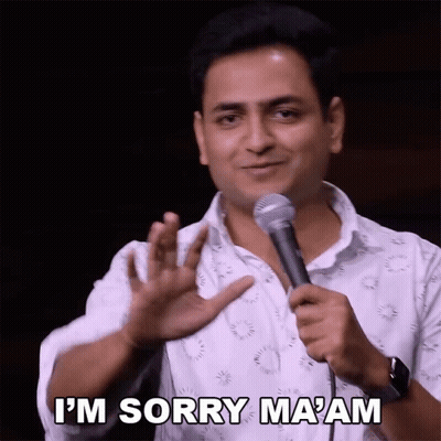 A Man Holds A Microphone And Says I 'M Sorry Ma Am GIF