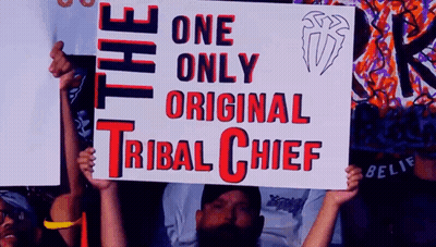A Man Holds A Sign That Says One Only Original Tribal Chief GIF