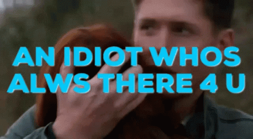 A Man Holds A Woman In His Arms With The Words " An Idiot Whos Alws There 4 U " GIF