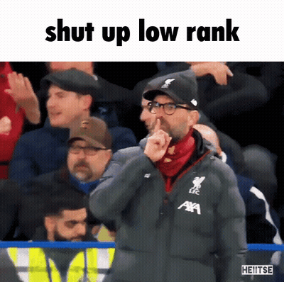 A Man Holds His Finger To His Nose With The Words Shut Up Low Rank Below Him GIF