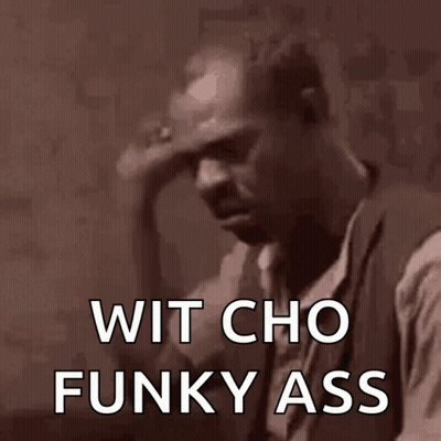 A Man Holds His Hand To His Forehead With The Words Wit Cho Funky Ass Written Below Him GIF