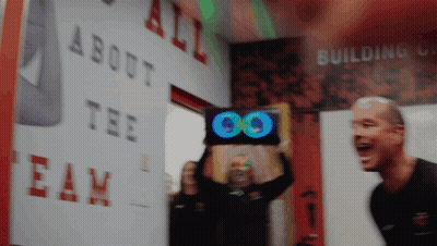 A Man Holds Up A Sign That Says 00 GIF