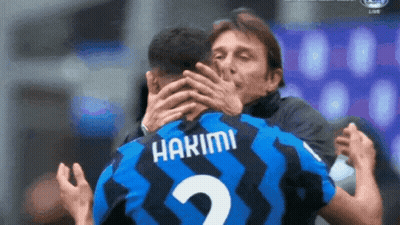 A Man Hugging A Soccer Player With The Name Hakimi On His Jersey GIF