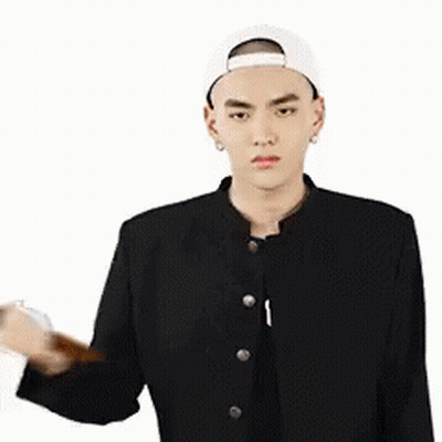 A Man In A Baseball Cap Is Holding A Hammer In His Hand And A Heart Is Behind Him . GIF