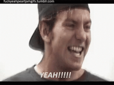A Man In A Baseball Cap Is Smiling And Saying Yeah !!! GIF