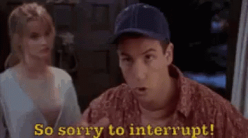 A Man In A Baseball Cap Is Talking To A Woman In A Room . GIF