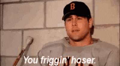 A Man In A Baseball Uniform Is Holding A Bat And Says `` You Friggin ' Hoser '' . GIF