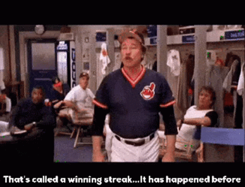 A Man In A Baseball Uniform Is Standing In A Locker Room And Says " That 'S Called A Winning Streak " GIF