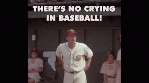A Man In A Baseball Uniform Stands In A Dugout With The Words " There 'S No Crying In Baseball " Above Him GIF