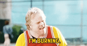 A Man In A Basketball Jersey Is Saying I 'M Burning GIF