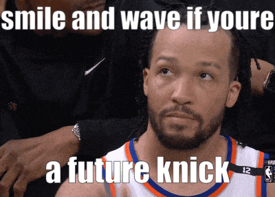 A Man In A Basketball Jersey With The Number 12 On It GIF
