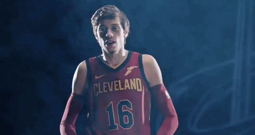 A Man In A Basketball Jersey With The Number 16 On It GIF