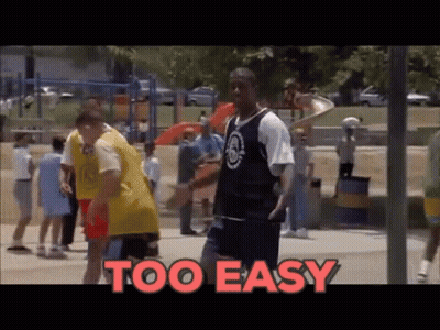 A Man In A Basketball Uniform Stands In Front Of A Playground With The Words Too Easy Behind Him GIF