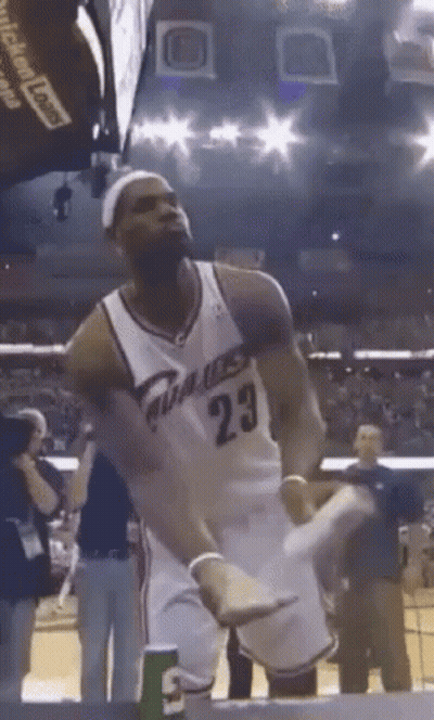 A Man In A Basketball Uniform With The Number 23 GIF