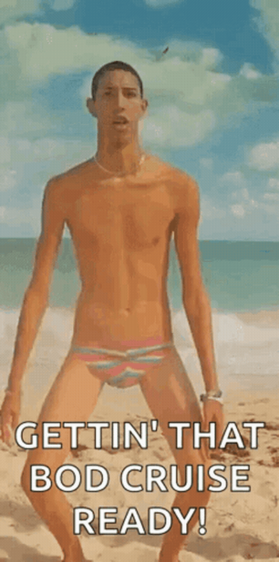 A Man In A Bathing Suit Is Standing On A Beach . GIF