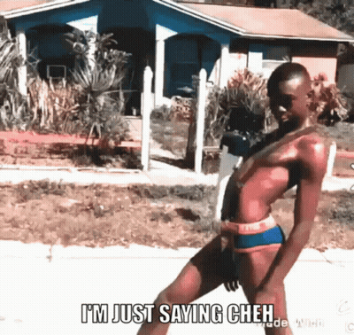 A Man In A Bathing Suit Says " I 'M Just Saying Cheh " In Front Of A House GIF