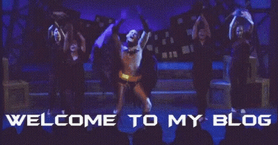A Man In A Batman Costume Is Dancing On A Stage With The Words Welcome To My Blog Above Him GIF