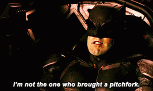 A Man In A Batman Costume Is Saying I 'M Not The One Who Brought A Pitchfork GIF