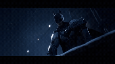 A Man In A Batman Costume Is Standing In Front Of A Building With A Sign That Says " Stars " GIF