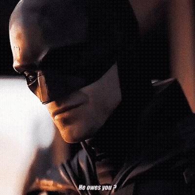 A Man In A Batman Costume Says He Owes You ? GIF