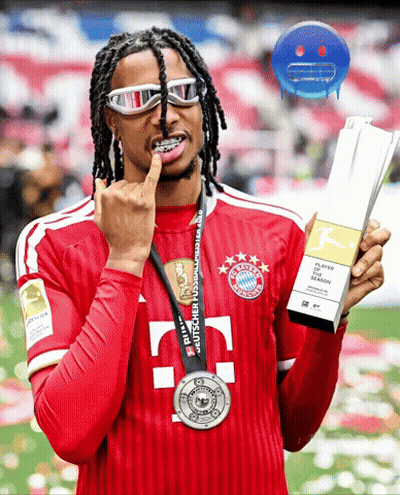 A Man In A Bayern Munich Jersey Holds A Trophy GIF