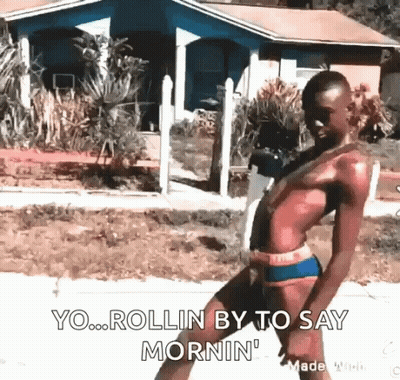 A Man In A Bikini Is Standing In Front Of A House And Says `` Yo ... Rollin By To Say Mornin '' . GIF