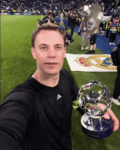 A Man In A Black Adidas Shirt Holds A Soccer Trophy GIF