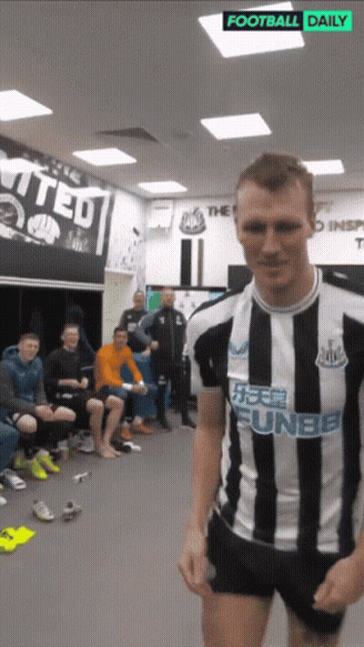 A Man In A Black And White Striped Shirt With Funbb On The Front GIF