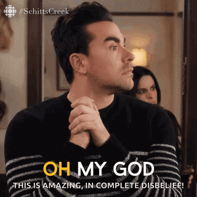 A Man In A Black And White Striped Sweater Says " Oh My God " GIF