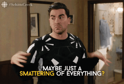 A Man In A Black And White Sweater Says Maybe Just A Smattering Of Everything GIF