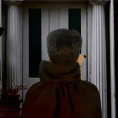 A Man In A Black Cape Stands In Front Of A Door Talking On A Cell Phone GIF