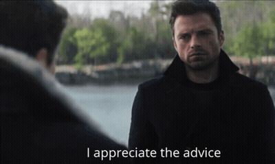 A Man In A Black Coat Says I Appreciate The Advice To Another Man GIF