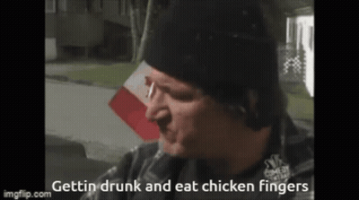 A Man In A Black Hat Is Eating Chicken Fingers . GIF
