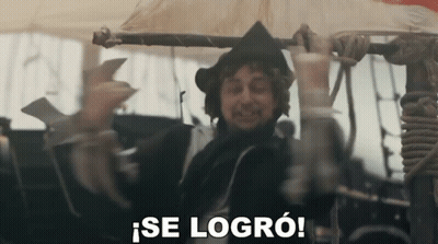 A Man In A Black Hat Is Holding A Pole And Says Se Logro GIF