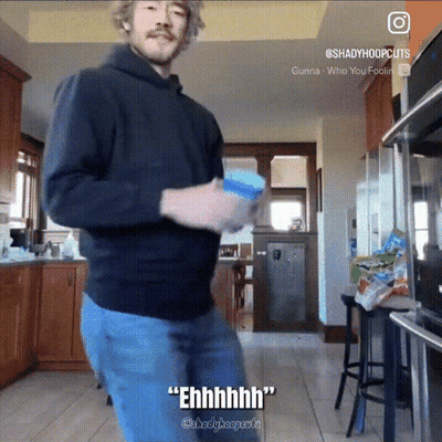 A Man In A Black Hoodie Is Dancing In A Kitchen With The Caption " Ehhhh " GIF
