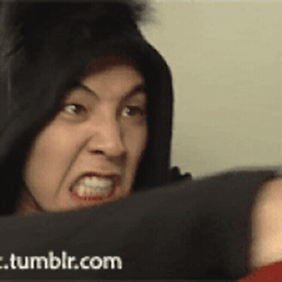 A Man In A Black Hoodie Is Making A Funny Face In Front Of A Tumblr.com Banner GIF