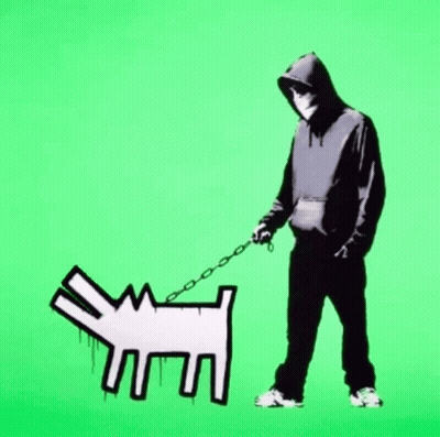 A Man In A Black Hoodie Is Walking A White Dog On A Leash GIF