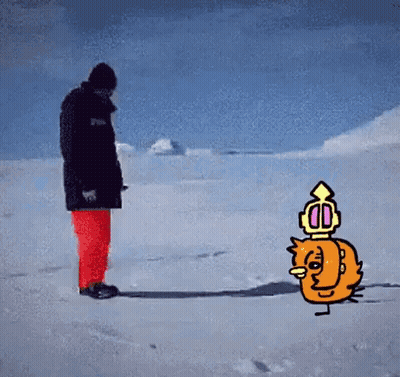 A Man In A Black Jacket And Red Pants Is Standing In The Snow Next To A Cartoon Character With A Crown On His Head GIF