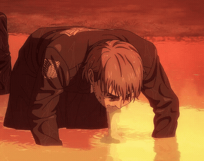 A Man In A Black Jacket Is Bending Over In A Puddle GIF