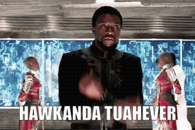 A Man In A Black Jacket Is Giving A Thumbs Up With The Words Hawkanda Tuahever Behind Him . GIF