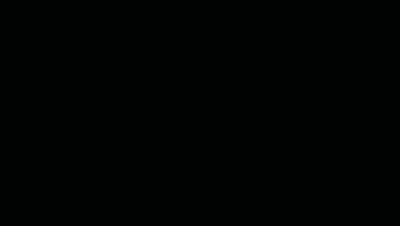A Man In A Black Jacket Is Holding A Gun In His Right Hand GIF
