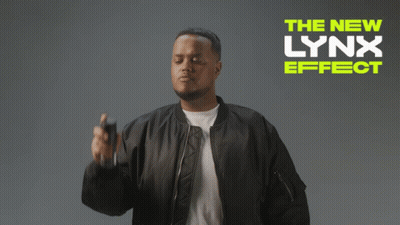 A Man In A Black Jacket Is Spraying Something With The New Lynx Effect Written On The Bottom GIF