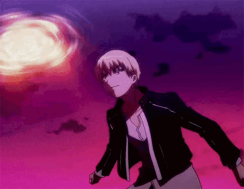A Man In A Black Jacket Is Standing In Front Of A Purple Sky With A Huge Explosion In The Background . GIF