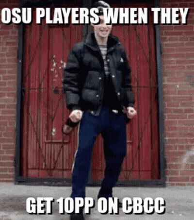 A Man In A Black Jacket Is Standing In Front Of A Red Door With The Caption Osu Players When They Get 10Pp GIF