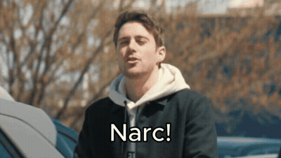 A Man In A Black Jacket Says Narc GIF