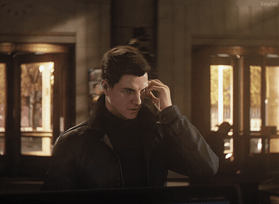 A Man In A Black Jacket Talking On A Cell Phone With The Word Kepler On The Bottom Right GIF
